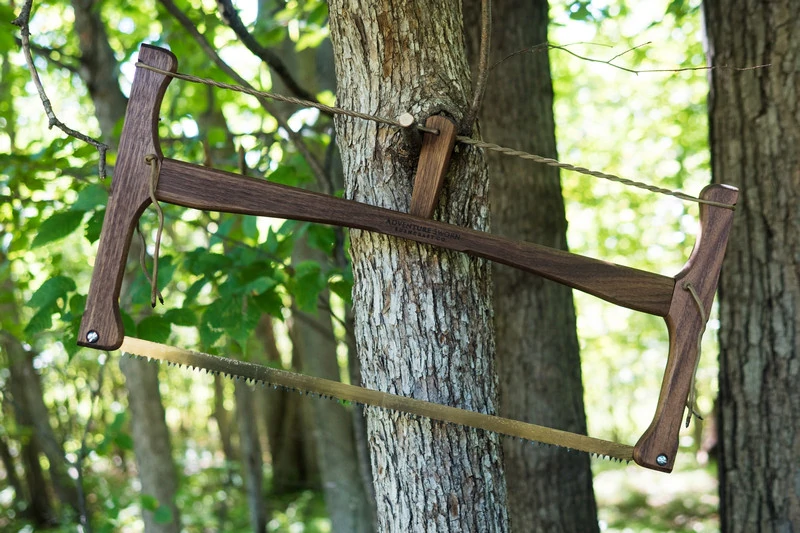 This Bushcraft Bow Saw Folds Up into Its Own Handles